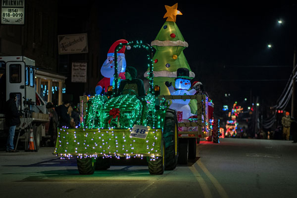 tractor decorated with lights in parade